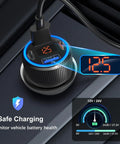Top Tier 65W 4 Port Usb C Car Charger 3 Pack With Digital Voltmeter connected in car showing charging status and socket.