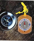 Orienteering Compass Ruler And Pointer For Hiking And Camping, Acrylic Survival Navigation Tool with yellow cord on wooden surface