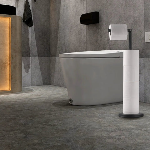 Free Standing Toilet Paper Holder With Storage In Matte Black No Fuss Heavy Base For Stability Anti Slip Floor Pad Rustproof Stainless Steel Construction in a bathroom with a modern toilet