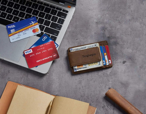 Coffee color Ultra Slim Wallet For Men With RFID Blocking 13.56 MHz, Minimalist Card Holder on desk beside laptop and cards