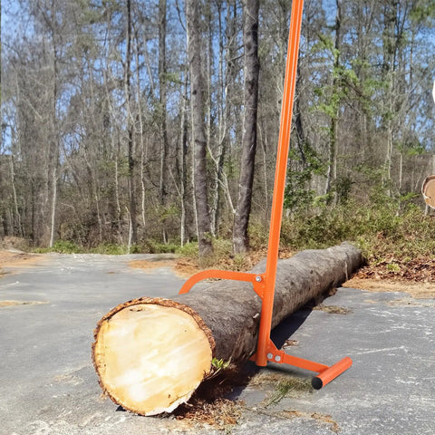 Timberjack Log Lifter With Adjustable Cant Hook And Rubber Grip Beefed Up Heavy Duty Tool lifting a log in a field