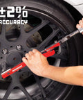 Person using Beefy Half Inch Drive Deflecting Beam Torque Wrench With Audible Click Accurate 20 To 220 Ft Lbs on car wheel