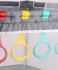 Five Color Baby Walk Assistant Rings for Toddlers Easy Stand Up Practice Tool Plastic Crib Pull Up Rings for Infant Cot Hanging Rings 3.5x7.5 Inches Bright Durable Set clipped to gray playpen rail