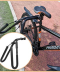 Heavy-Duty Bike Surfboard Carrier Bracket For Ride-Ready Trips attached to black bike on path, side view