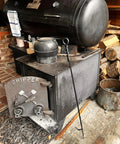 Beefy 40 Inch Heavy Duty Fire Poker With Twisted Rope Grip Solid 12mm Steel by a vintage wood stove and logs