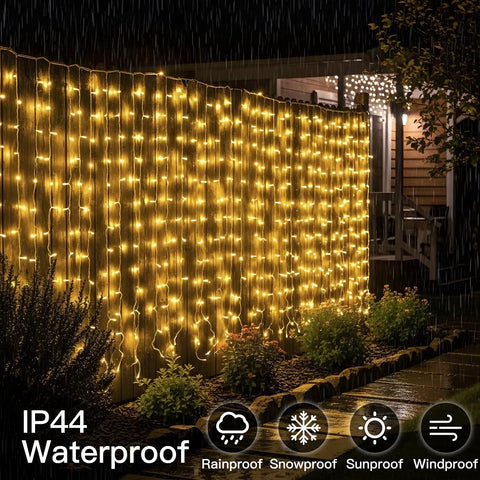 Warm White Curtain String Lights 300 LEDs 9.8x9.8 Ft Plug In Backdrop draped on a fence in the rain, IP44 waterproof