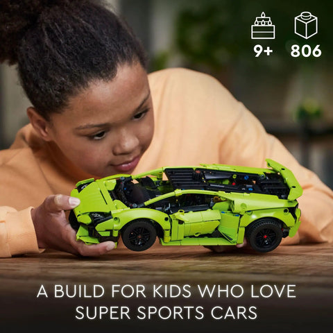 Child playing with Technic Lamborghini Huracan Tecnica Advanced Build Kit For Kids 9 And Up Realistic V10 Engine And Detailed Exterior