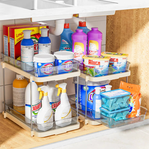 No Fuss Slide Out Two Tier Under Sink Organizer With Reconfigurable Dividers Stackable Pantry Storage Rack In Warm Beige loaded with cleaning supplies.