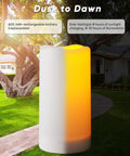Lit Outdoor Solar Pillar Candles 3x6 Inches Waterproof Rechargeable Flameless Flickering Lights With Dusk To Dawn Sensor in garden