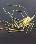 Brass Tapered Clock Repair Pins Set Of 50 Sizes .030 To .065 Inches Each 1 Inch Long For Precision Movement Repairs spread on black surface