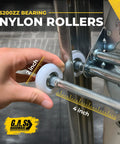 Hand holding nylon rollers showing 2 inch and 4 inch sizes for Do It Yourself Friendly Garage Door Hardware Installation Kit For 8x7 Doors