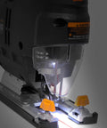 Gassed Up Variable Speed Orbital Jig Saw With Integrated Laser And Hella Bright Led Work Light illuminating the cutting area.
