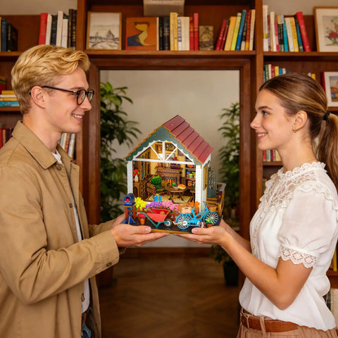 Two people holding Totally Awesome Miniature Dollhouse Kit With 3D Wooden Tiny Building Model Puzzle And LED Lights For Beginners