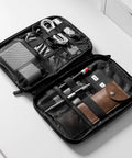 Travel Ready Electronics Organizer Case For Cords And Tech Gear open with cables, pens, and adapter inside compartments