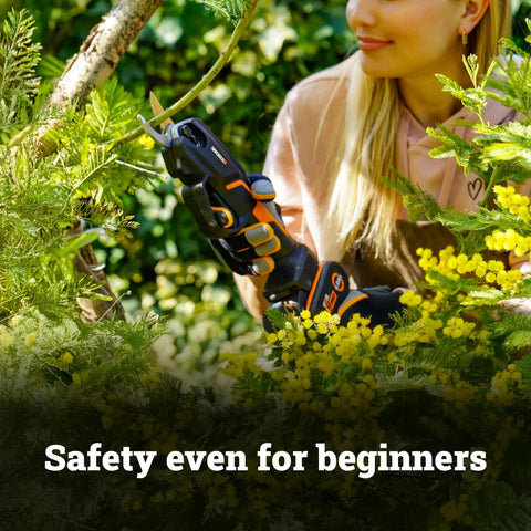 Person using 20V Nitro Pruning Shear And Lopper WG330 Cordless With Titanium Plated Blade Brushless Motor in garden