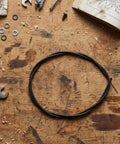Direct Fit Beefed Up Drive Shaft Cable Replacement For FC55 FC56 FC70 FS56 FS70 Lawn Mower on a wooden table with tools