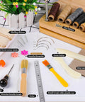 All In One Book Binding Kit With Press And Wooden Binding Press Includes Book Cloth Book Cover Boards Bone Folders Awl Wax Thread Bind Straps And Ribbons For DIY Journal And Album Making Great For Beginners And Crafters displayed with tools and materials