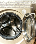Magnetic Front Load Washer Door Prop And Dryer Vent Holder With Grippy Silicone Base To Keep Your Machines Cracking Open And Smelling Totally Fresh White, shown holding a washer door open.
