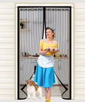 Woman and dog standing in doorway with Magnetic Screen Door For Doors Up To 37 By 82 Inches, Self Sealing Mesh Magnetic Closure