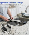 Person adjusting Adjustable Sink Bridge Whetstone Holder For Kitchen Sink Heavy Duty 304 Stainless Steel over a kitchen sink
