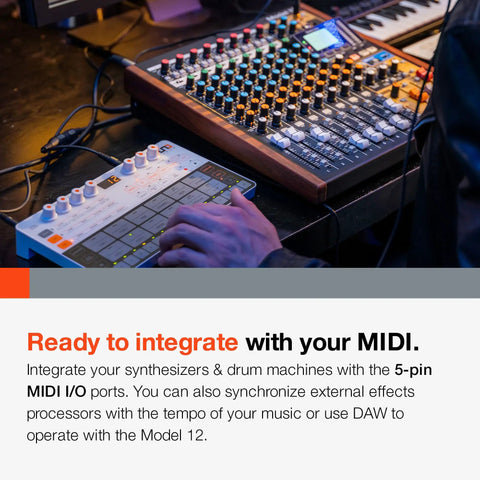 Musician using All In One 12-Track Digital Multitrack Studio Mixer With USB Audio Interface And DAW Control, MIDI, and tap tempo.
