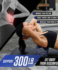 Woman using 18 inch blue speckled EPP foam roller for back pain relief and deep tissue recovery in yoga with focus on flexibility boost