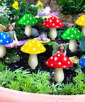 8 Pack Solar Mushroom Lights For Garden Decor With 8 Modes Waterproof Outdoor Mushroom Lamps in vibrant flowerbed with fairy figures