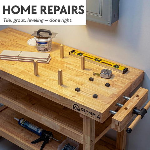 Beefy Rubberwood 60 Inch Workbench with two storage shelves, vise slot, bench dog holes, and tools for garage workshop.