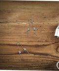 Upgrade Your Kitchen Trash Can With This 4 Piece Stainless Steel Torsion Spring Kit Featuring Dual Coil Design For Easy DIY Installation And Stable Lid Operation On Various Household Garbage Bins You Will Love This Quick Fix Solution. 4 stainless steel torsion springs on wood