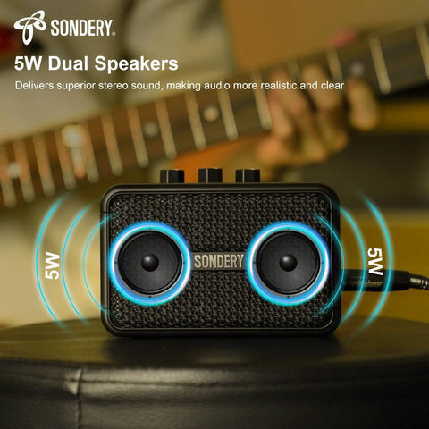 Ultra Portable 5W Mini Guitar Amp For Electric Guitars With Two Speakers And Rechargeable Battery on a table
