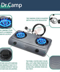 Image showing the 35000 BTU Two Burner Propane Gas Stove Cooktop For Outdoor Camping with blue flames, CSA regulator, and controls.