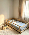 Twin Montessori Floor Bed With Full Surround Safety Guardrails For Little Explorers, Crafted From Premium Pine Wood in cozy nursery.