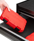 Hand placing S2 steel case of Three Eighths Inch Drive Long Hex Bit Socket Set 18 Piece SAE One Eighth To Three Eighths Inch and Metric into drawer