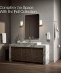 Vertical Toilet Paper Holder In Brushed Nickel Finish For Easy Refill And Modern Bathroom Coordination Part Of Components Collection With Durable Steel Mount And Slim Wall Post in a contemporary bathroom setting.