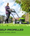 Woman using 40V Cordless 21 Inch Brushless Lawn Mower With Self Propelled Smart Pace No Gas Easy Start Up To 60 Minutes Runtime
