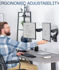 User adjusting Super Smooth Heavy Duty Double Arm Dual Monitor Wall Mount With Zero Hassle Quick Height Adjustment For Two 17 To 32 Inch Monitors Total Flex Full Motion Articulating Black.