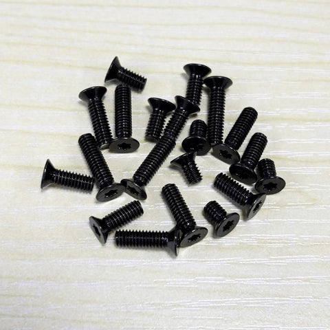 Close-up of Red Dot Torx Screw Kit For Plates And Mounts With M3 M3.5 M4 And Thread Sizes, black carbon steel finish screws.