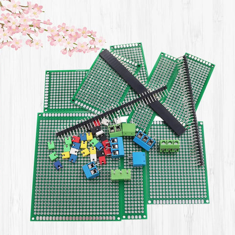 82 Piece Double Sided PCB Board Kit With Five Sizes And 40 Pin 2.54mm Male And Female Header Connectors displayed on surface