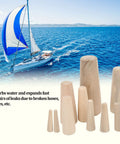 Boater Ready Wooden Conical Bungs Plugs Set Ten Pcs For Thru Hull Emergency Seals Soft Wood Drain Plugs in front of a sailing yacht