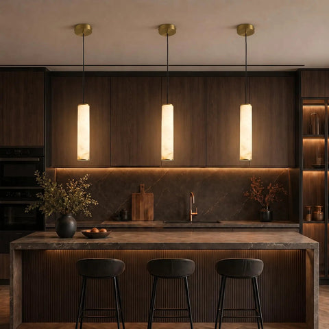 Omgomne Natural Spanish Alabaster Pendant Light 11.8 inch above a modern kitchen island with dark wood cabinets.