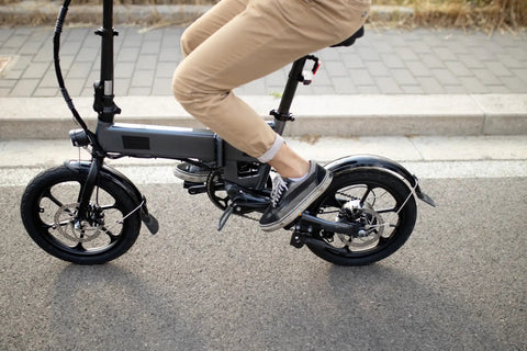 Rider on electric bike using Two Pack Bike Tubes With Bent Valve For Electric Bikes Kids Bikes And Electric Scooters Made From Butyl Rubber