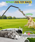Tether Dog Toy Rack With 3 Tug Rope Toys Rotating Outdoor Tug Toy Stand, dog playing in yard, dog rack angled view.