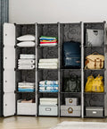 Nine Cube Portable Closet Wardrobe With Doors Space Saver Storage Organizer For Clothes Shoes And More Modular Bookcase Cubby Cabinet For Bedroom Black Durable Plastic Construction Easy Assembly Flexible Cubby Layout with various items on display.