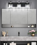 Three Light Black Crystal Vanity Lights for Bathroom Over Mirror mounted on wall, sleek matte black finish, crystal shades, 24 inch long