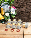 Quick Garden Hose Repair Kit With 3 Aluminum Connectors And Zinc Clamps Fixes Leaks On 3/4 Inch And 5/8 Hoses Perfect For Outdoor Faucets and Yard Care Essentials on wood deck