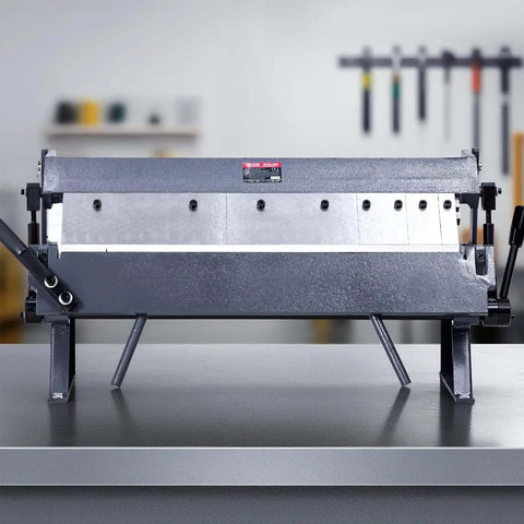 Front view of Box and Pan Brake 24 Inch Sheet Metal Bender, 16-Gauge Mild Steel Capacity, adjustable aluminum folder on workbench.