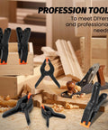 10-pack 4.5-inch black plastic spring clamps with orange non-slip pads on a woodworking bench.