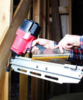 1000 Count 2 Inch Framing Nails With Ring Shank And Flat D Head 21 Degree Galvanized Plastic Collated Strip shown in pneumatic nailer.
