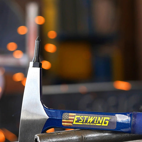 Replacement Tips For E3 WCT Welding Hammer Five Pack Made In USA 4140 Steel Tips with chisel side, shown with blurred welding sparks.