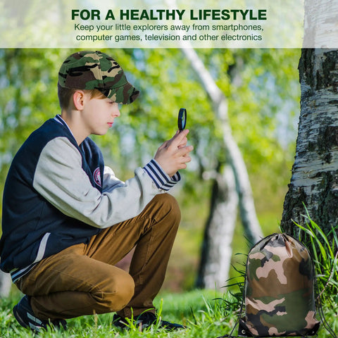 Child using a magnifying glass outdoors with camo backpack beside them, part of an Outdoor Adventure Kit For Kids With Walkie Talkies, Binoculars, And Magnifying Glass, Kid Friendly Explorer Gear For Camping, Hiking, And Backyard Fun, Creative And Educational Play Set For Boys And Girls.